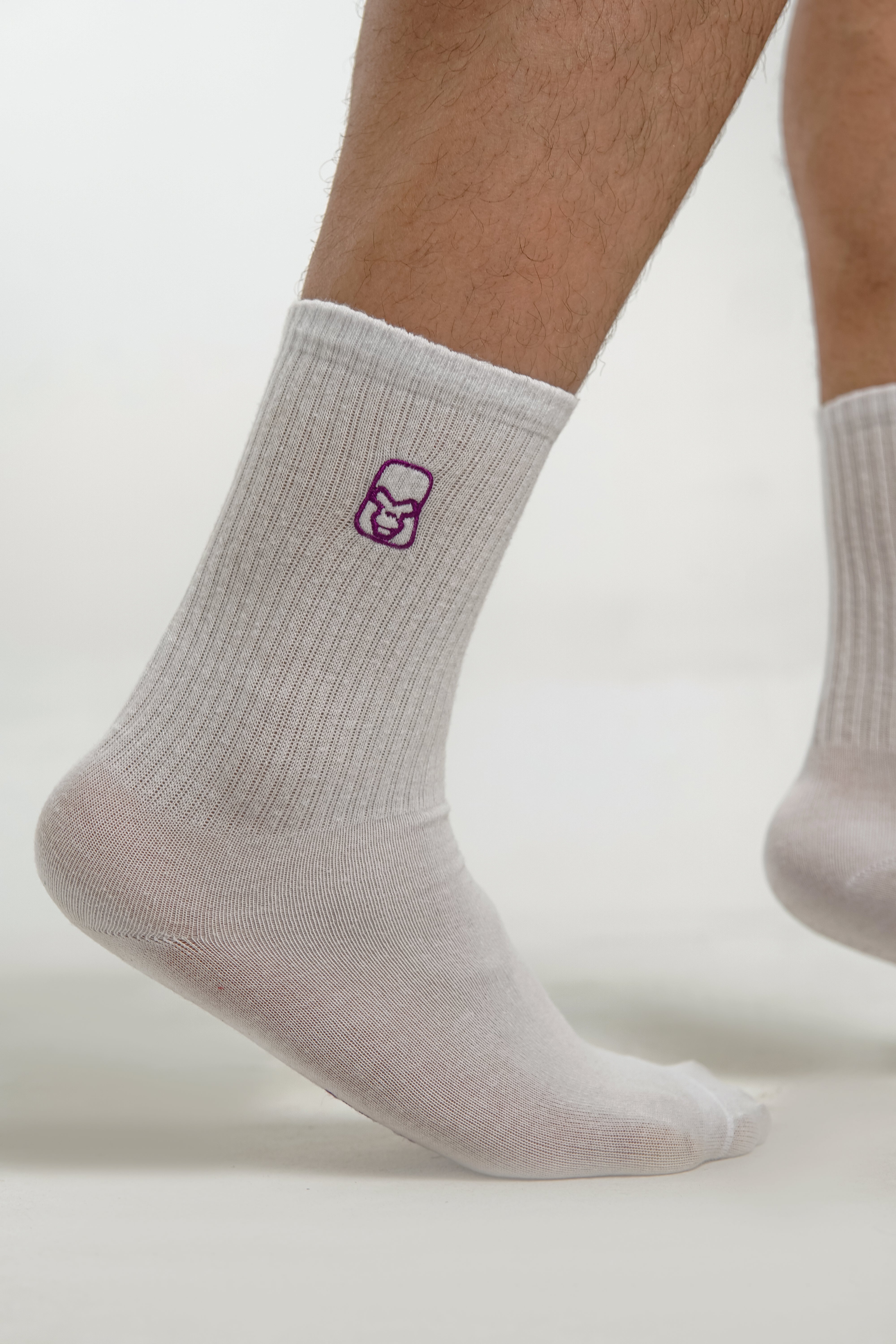 WHITE SPORTS SOCKS WITH PURPLE LOGO